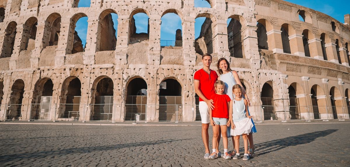 Panorama of family in Rome over Coliseum on european vacation